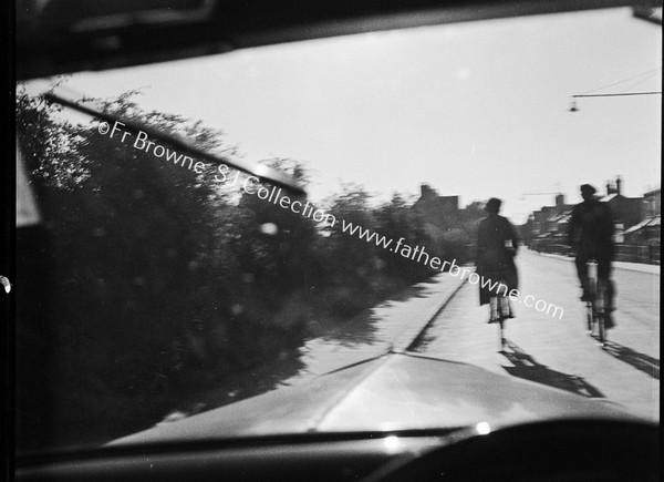 CYCLISTS THROUGH WINDSCREEN